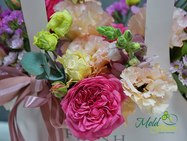 Small bag with pink roses and eustoma photo